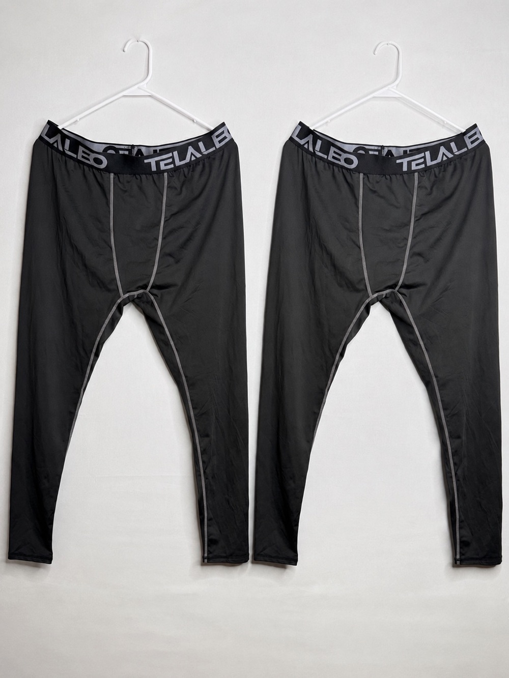 two pairs. sports men's compression pants TELALEO
XXL A7 381